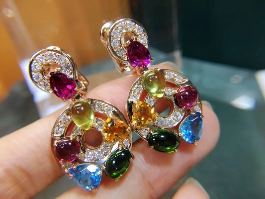 Astrale earrings 18k yellow gold set with blue topaz, green tourmaline, peridot, citrine and red garnet set with diamond