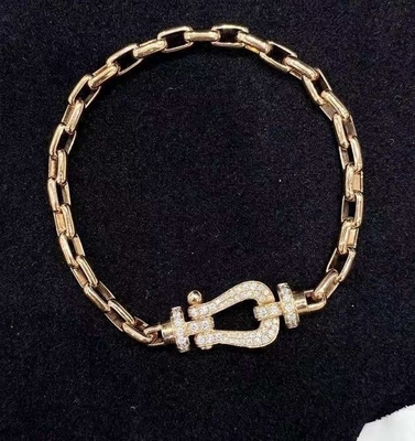 เครื่องประดับทองคํา 18K FORCE 10 BRACELET แบบ L ในทองเหลือง 18K และเพชร