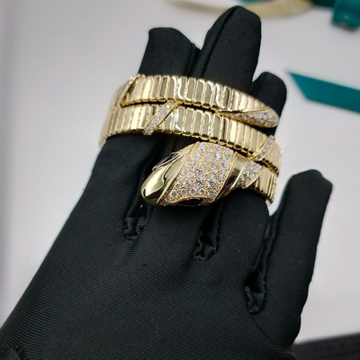 สร้อยข้อมือทองคํา 18K ลักชัวร์เพชร Serpenti สองลวด 18 Kt สร้อยข้อมือทองเหลืองชุดด้วยเพชร Demi Pavé และตา Onyx ดํา